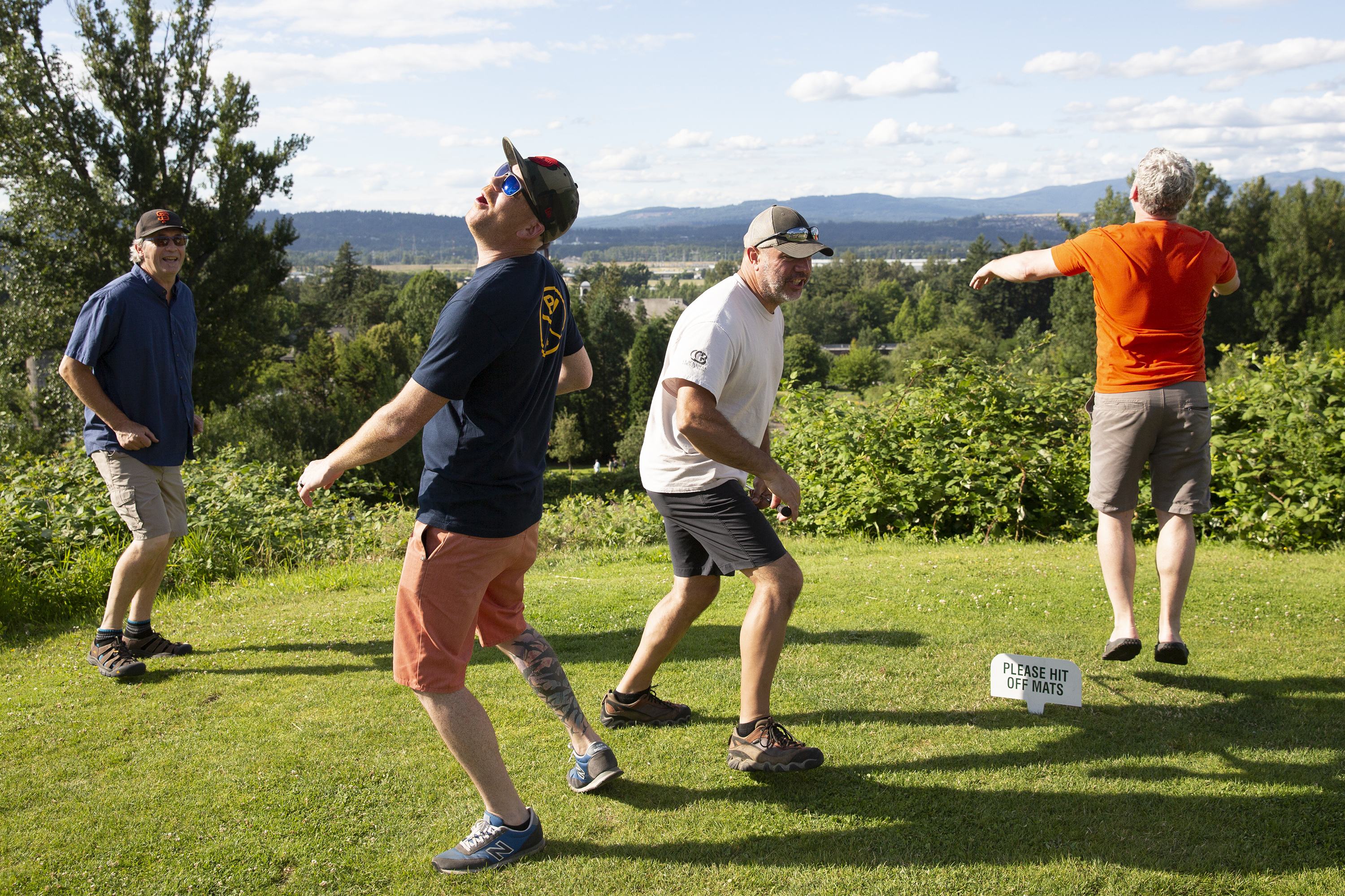 Golf group reacting to shot